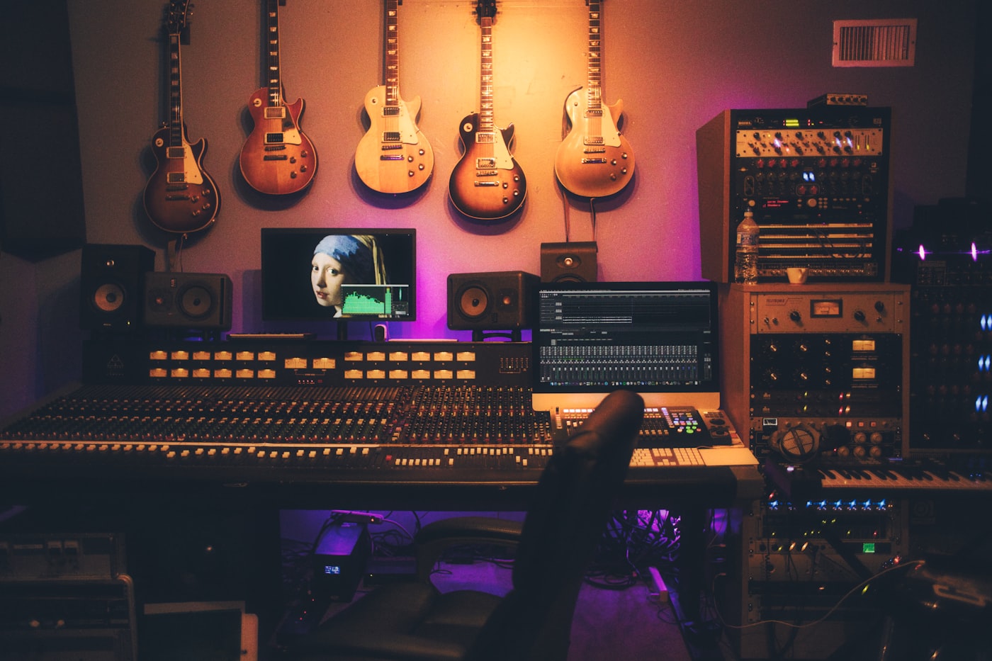 Studio microphone and stage light — illustrative stock