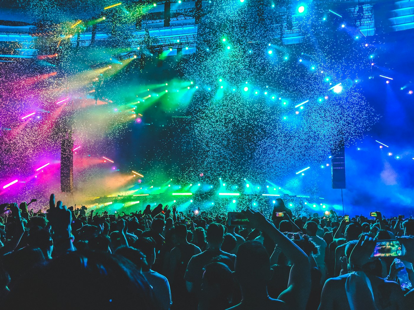 Concert stage lights and crowd — illustrative stock
