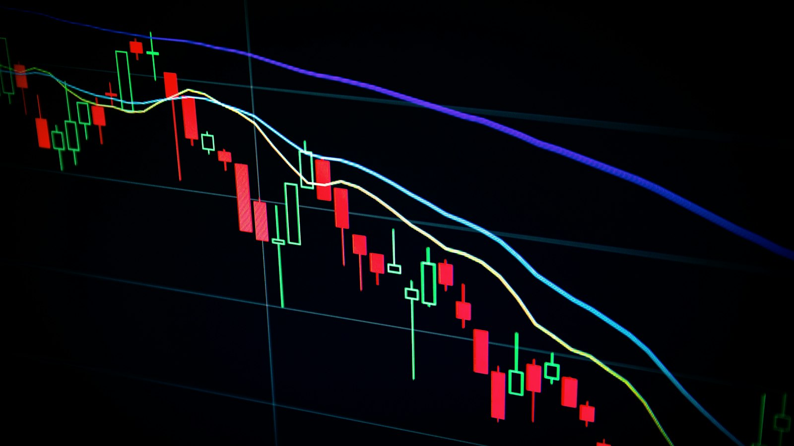 Illustrative stock-market chart on screen — bond yields theme