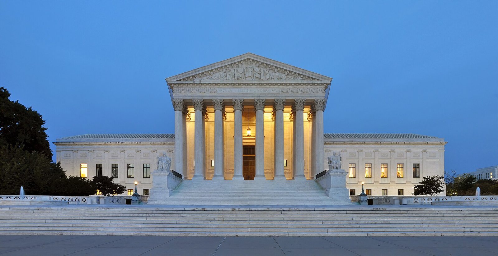 The U.S. Supreme Court building in Washington at dusk — illustrative